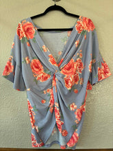 Light blue floral waffle knit top with twisted back