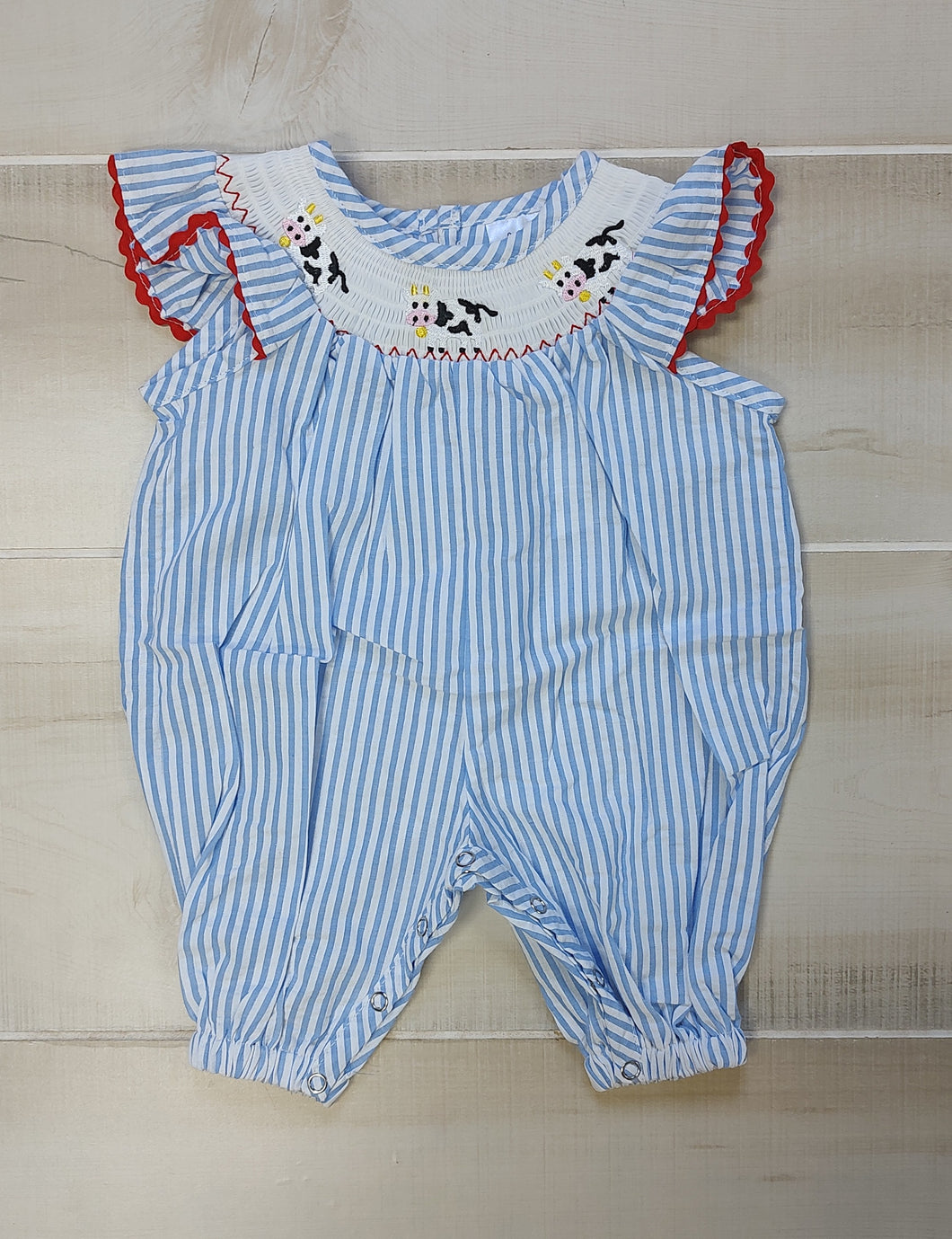 Light blue and white striped cow baby romper